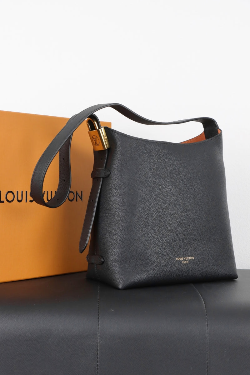 Bolsa Low Key Hobo PM Louis Vuitton